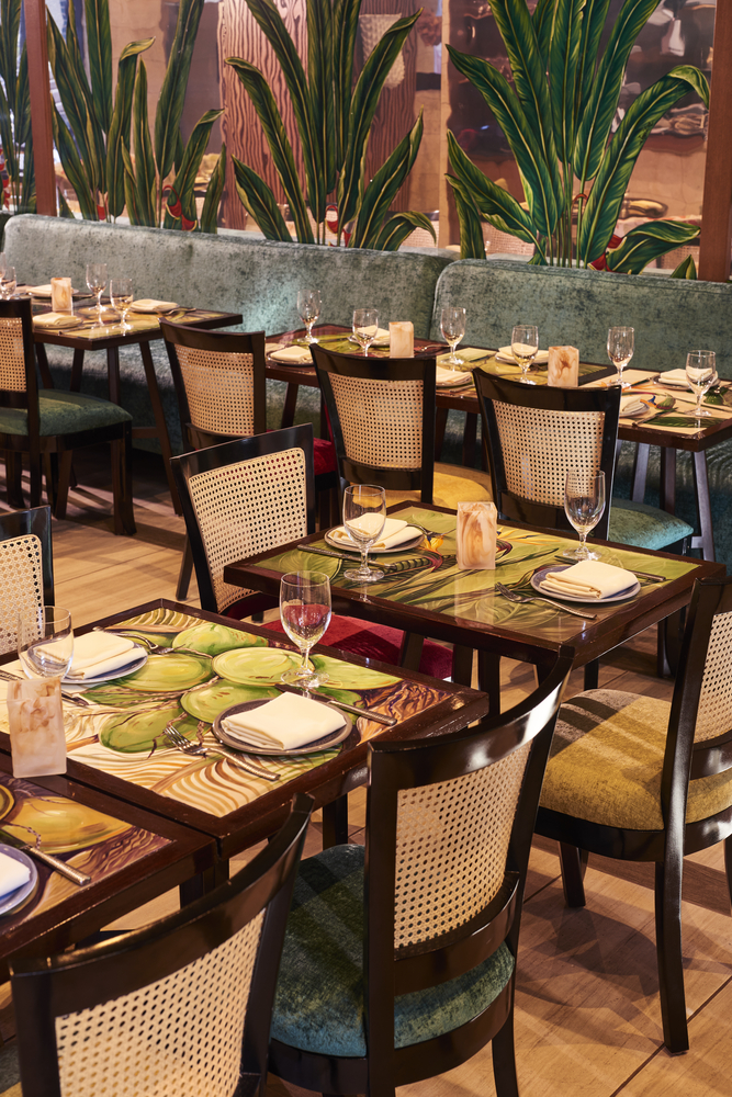 a restaurant dining area with tables and chairs